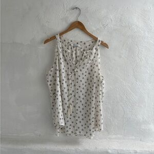 Rose + Olive women's sleeveless top with a star print